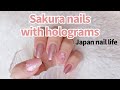 sakura nails with holograms and regular polish