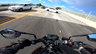 Bad Driver U turns illegally in front of Biker