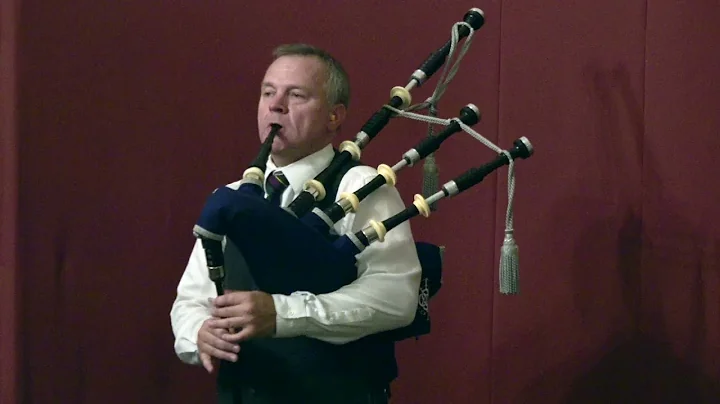 Encore by master piper Stuart Liddell during conce...
