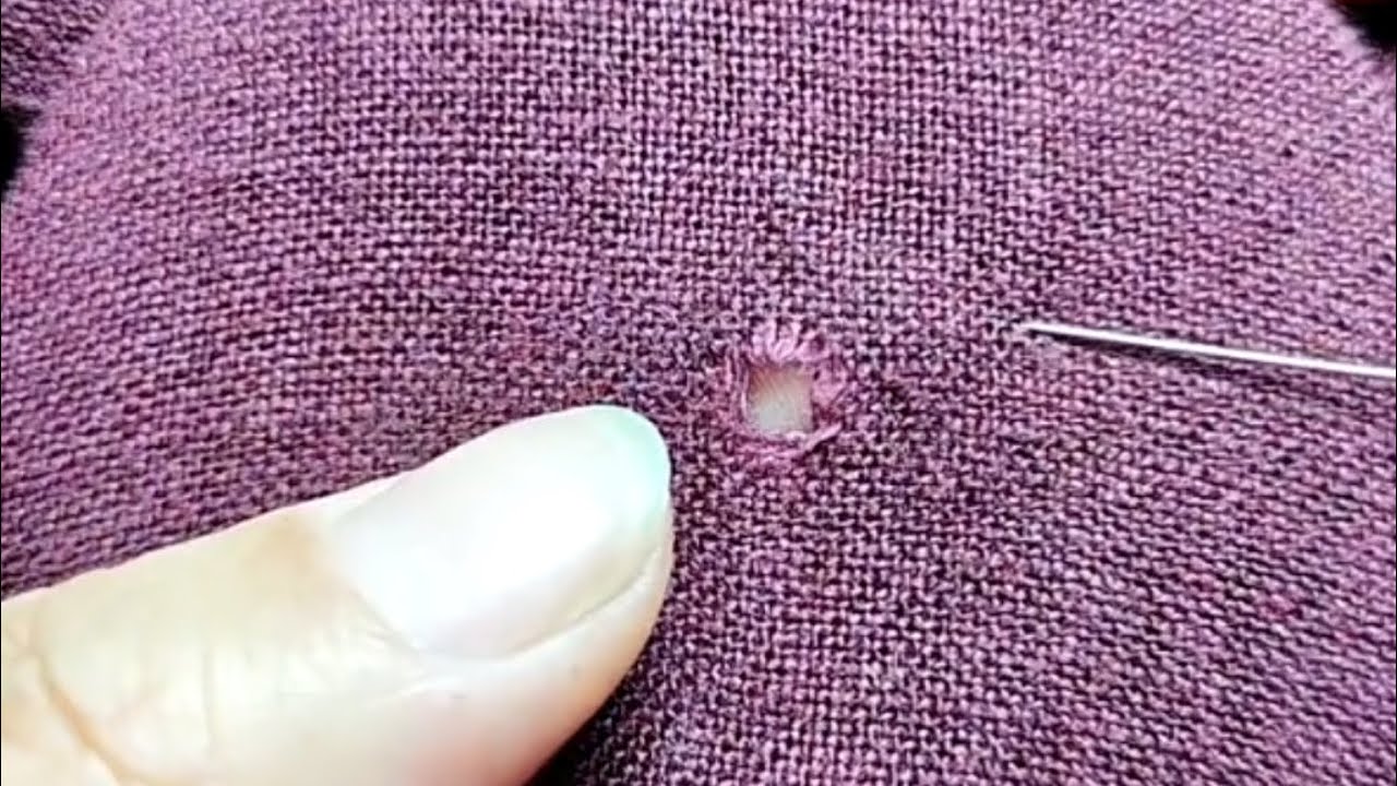 How to repair a hole in clothing at home using a sewing needle - YouTube