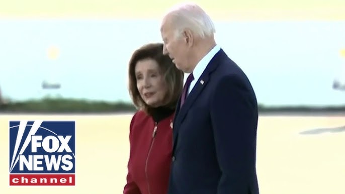 Incompetent Pelosi Guides Biden Through Tarmac Hand In Hand