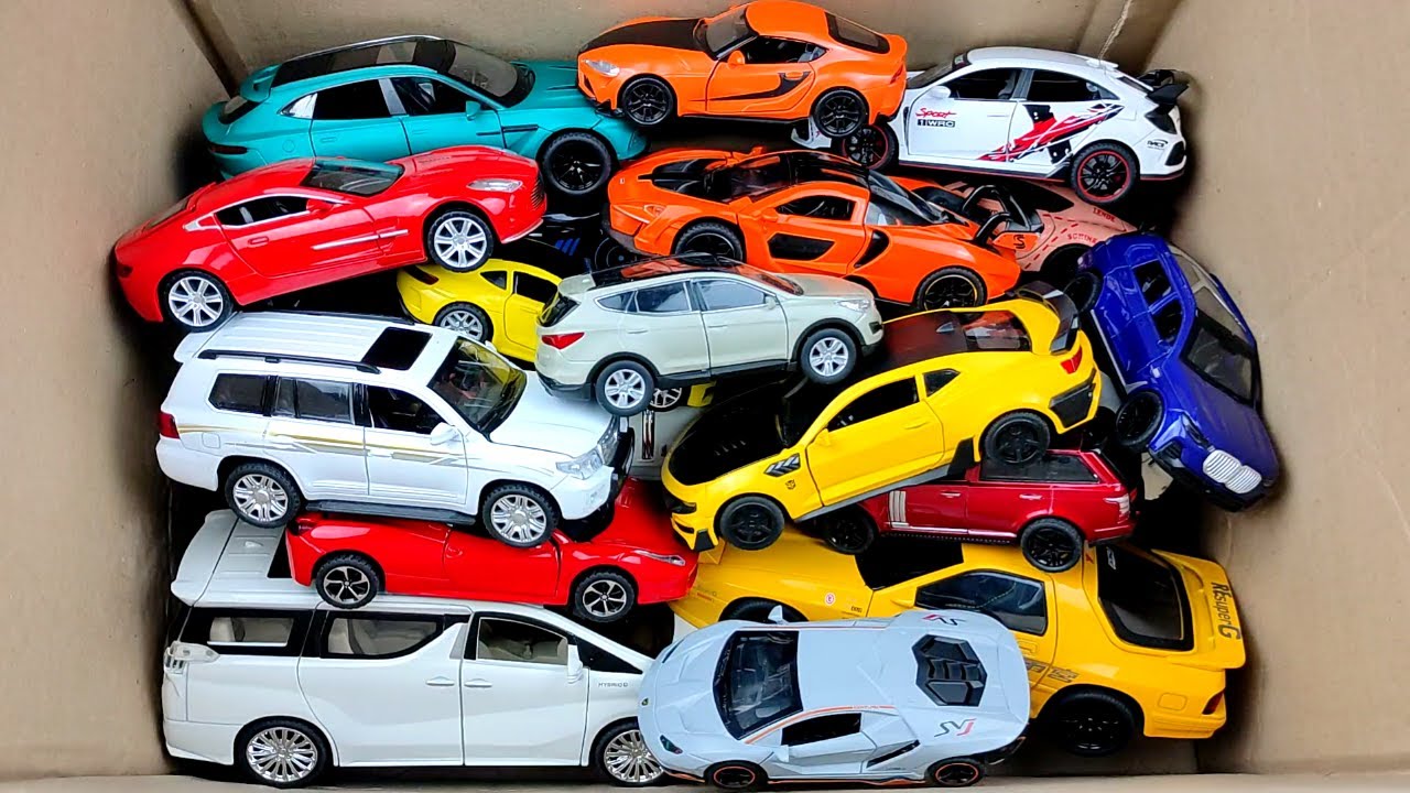 box-full-of-model-cars-mazda-mx5-koenigesgg-jesko-lamborghini-scv12
