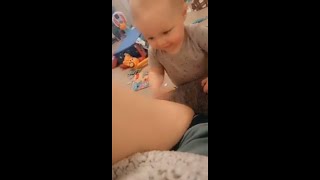 Little Baby Boy Enjoys Playing With His Mom's Jiggly Thighs