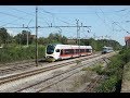 EHR086789 Croatian railcars 4111-008 and 6112-006 cross in Zdenčina railway station in Klinča Sela