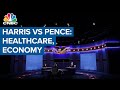 Pence and Harris spar on economy and healthcare