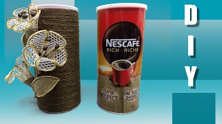 Beautiful flowers on a coffee can DIY handicraft