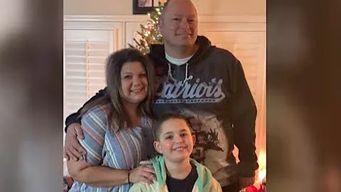 Officers walk boy to school after father, fellow o...