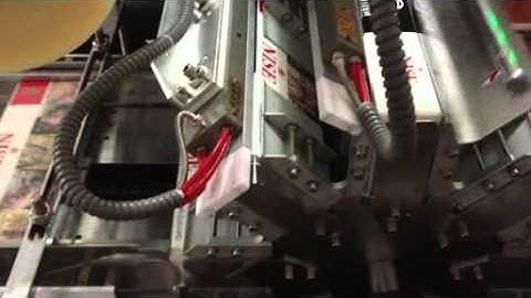 Cellophane wrapping machine for cigarette box groups