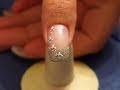 Nail art with half pearls and glitterpowder in silver