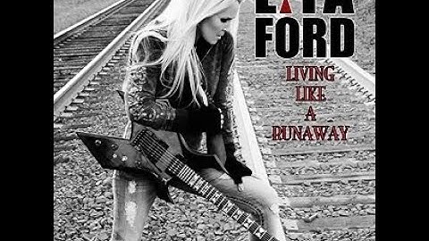 Lita Ford:-