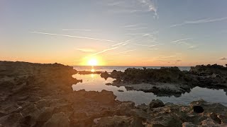 Ocean sunset w/ tidal reflection pond on rocky shore. #background #relaxing #sunset
