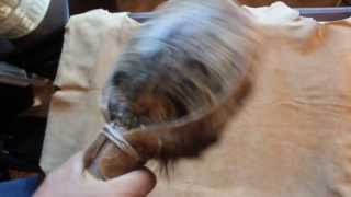 Johnny Gibot demonstrating his handcrafted Turtle Rattle