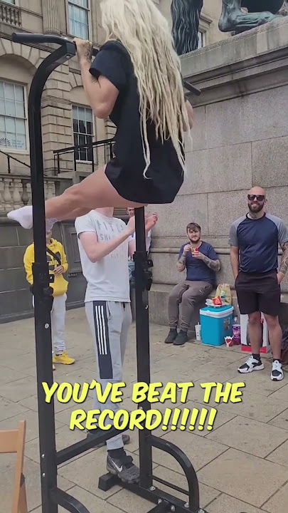 Pole Dancer In a Pull-Up Competition