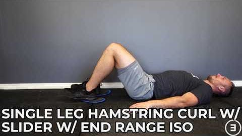 Single Leg Hamstring Curl with Slider with End Range Isometric