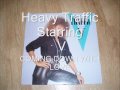 Heavy traffic starring v    coming down with love