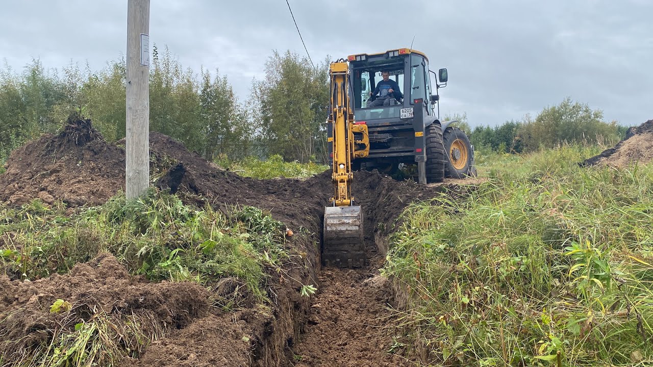 Экскаватор LiuGong 777 A-S - расчищаем китайцем дренажную канаву и делаем заезд на участок.