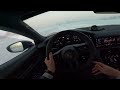 Drifting Taycan Turbo S on ice track.