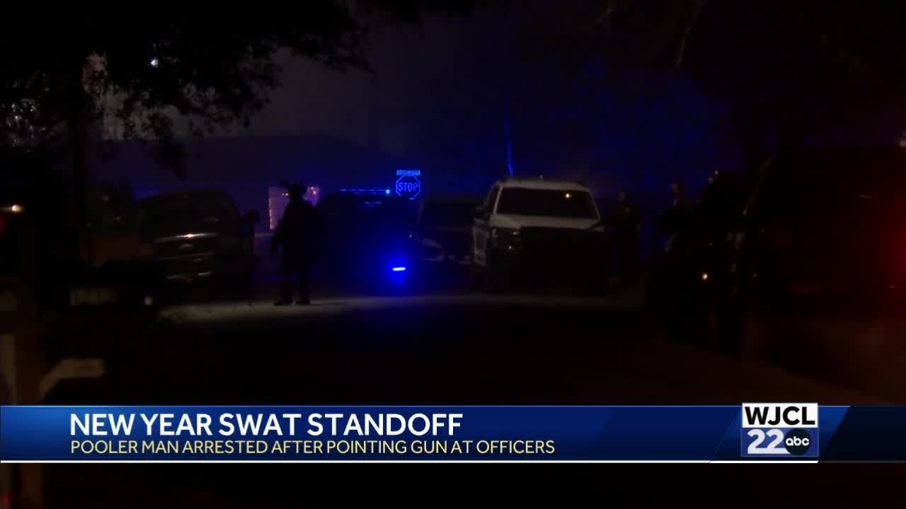 SWAT team apprehends suspect after early New Year's Day standoff - YouTube