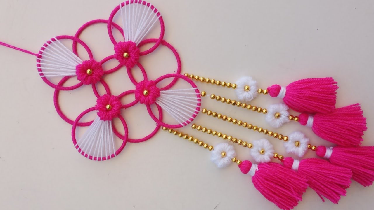 Easy Woolen wall hanging craft ideas/New wall hanging design/Chudi ki toran/Woolen design/toran