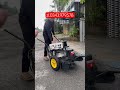 xe đẩy cắt cỏ máy xăng