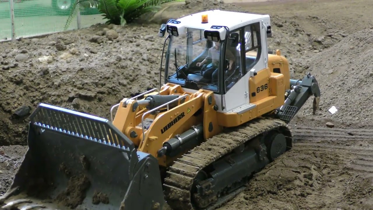 Liebherr 636 pushing soil at the landfill