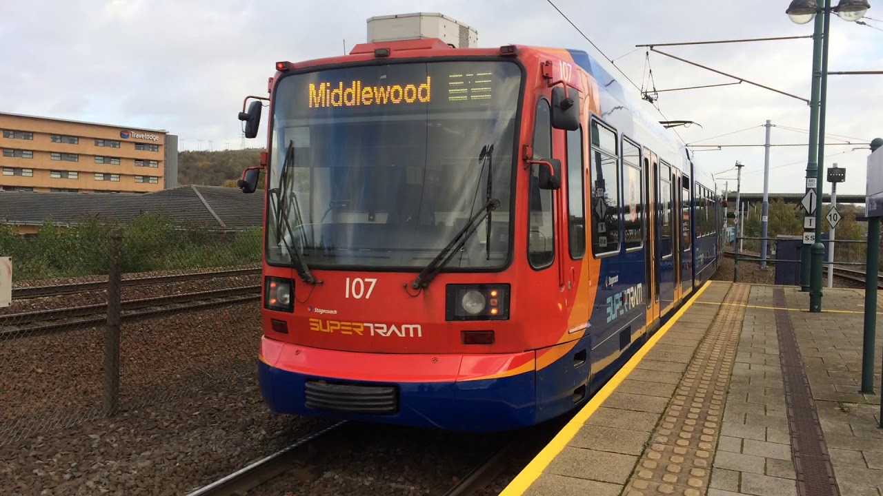 Sheffield Supertram 107 departs Meadowhall for Middlewood on the Yellow