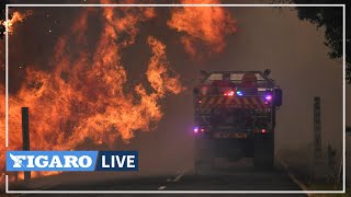 Des pompiers australiens ont conduit au milieu d’une forêt en feu