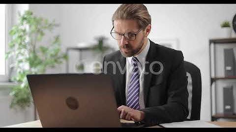 Man Using Laptop for Work at Office | Stock Footage - Envato elements
