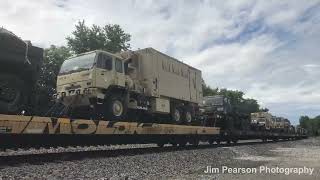 May 29, 2018 - BNSF 7969 and 988 leads CSX W865-27 a Military through Anaconda, north of Sebree, Ky.