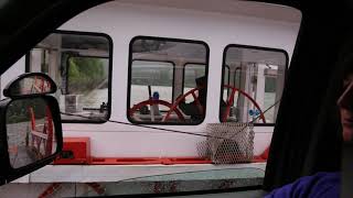 Usk Reaction Ferry crossing the Sheena River, British Columbia, Canada in flood.