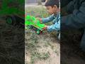 Ready steady Go😍😘🥰. A little boy is playing with a green toy #kids #toys #toyexcavator #kidsplay