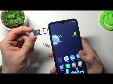 Установка SIM-карты и SD-карты памяти в Xiaomi Redmi 9AT