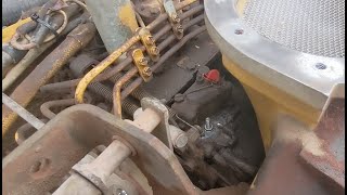 Adjusting the high RPM limit on a Cat 3208 diesel engine.