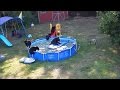 Momma bear and cubs caught having a pool party in backyard