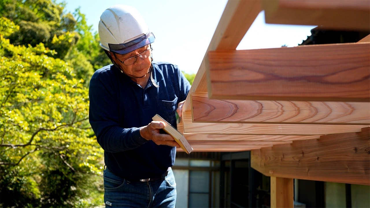 Carpenter Builds a Wooden Terrace Roof by Hand