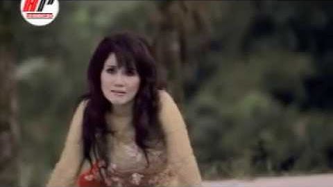 Tersisih -  Rita Sugiarto Lirik (Official Video)