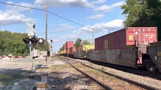 Canadian National intermodal/auto racks east crosses CSX @ Wellsboro, Indiana on September 18, 2022