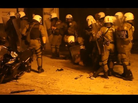 Greek Riot Police beating up a defenseless protester (15 July 2015)