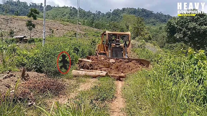 Highest risk job CAT D6R XL BULLDOZER Operator Clearing Plantation Road on Edge of the Ravine