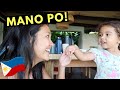 teaching her FILIPINO GAMES & TRADITION