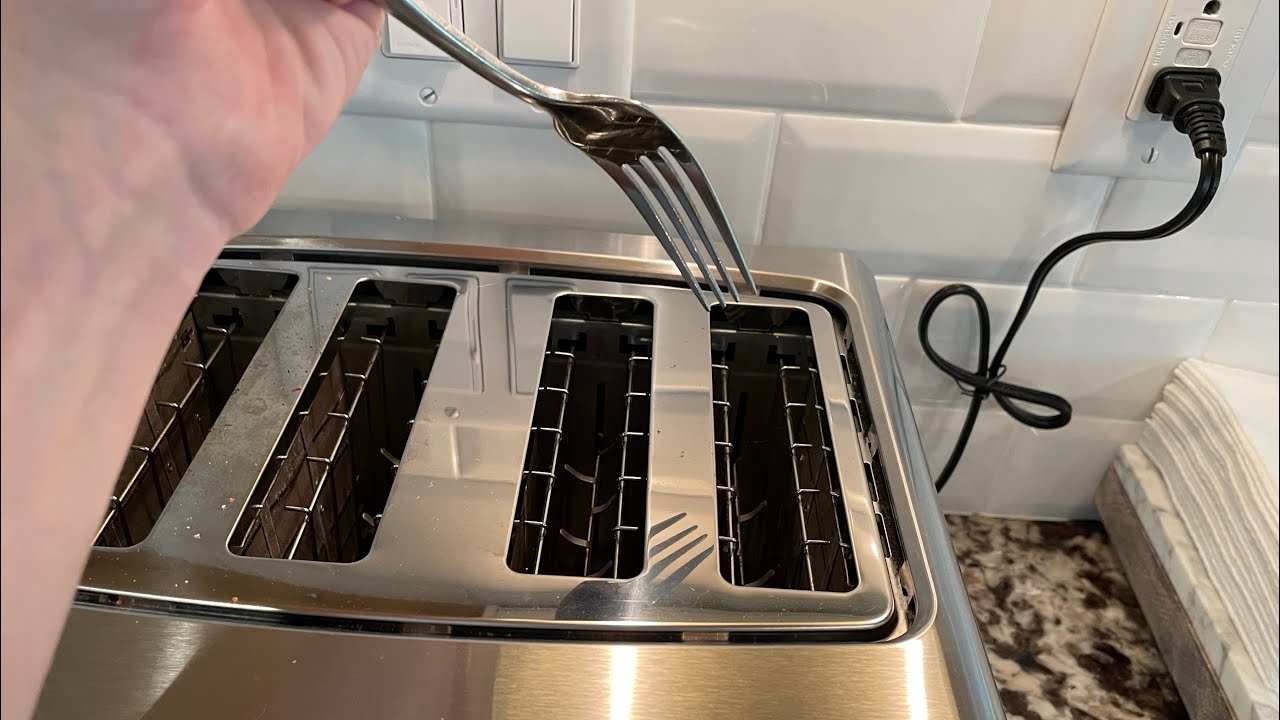 Sticking A Fork Into A Toaster YouTube