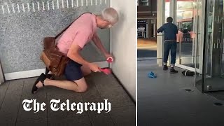 video: Extinction Rebellion smash windows at Rupert Murdoch’s offices in protest over Sun and Times’ climate coverage