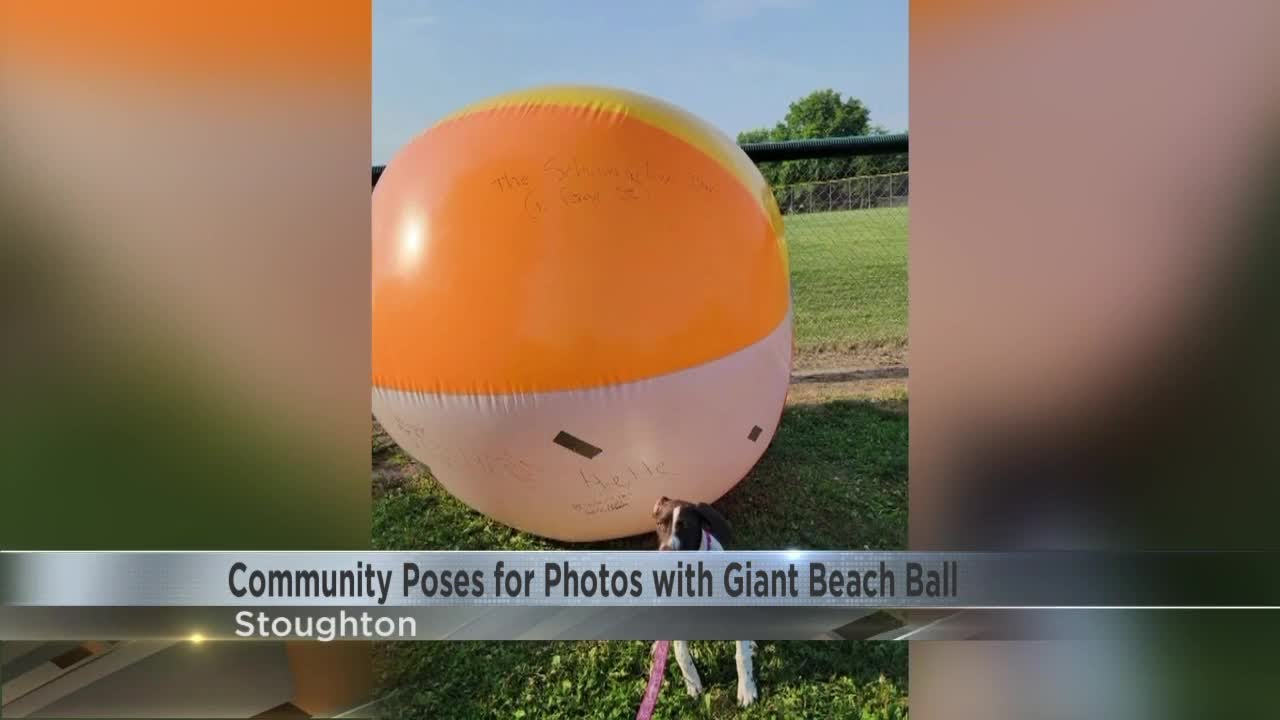 Community Poses for Photos with Giant Beach Ball YouTube