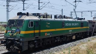 WAG9HC 33569 UNIQUE SILVER/GREEN/YELLOW/GREEN FREIGHT ENGINE HAULS TANKER TRAIN AT INDUSTRY