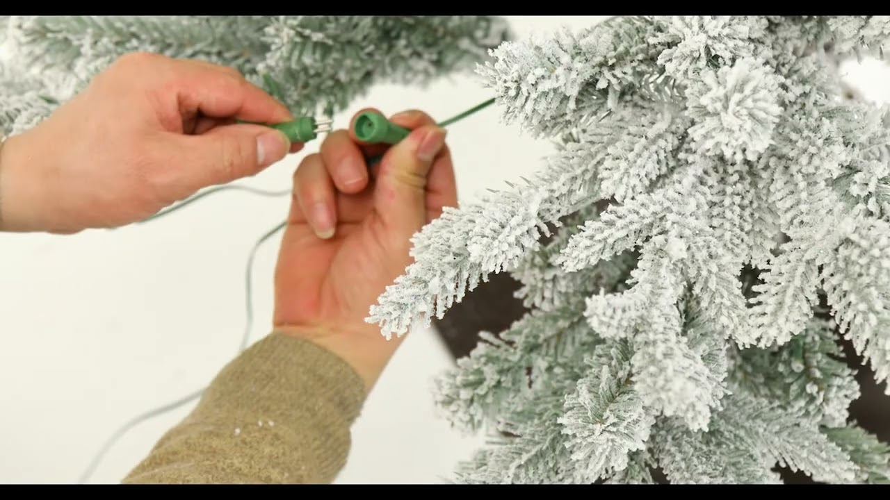 Assembly instructions of Glitzhome 8ft Deluxe Pre-Lit Flocked Fir Artificial Christmas Tree