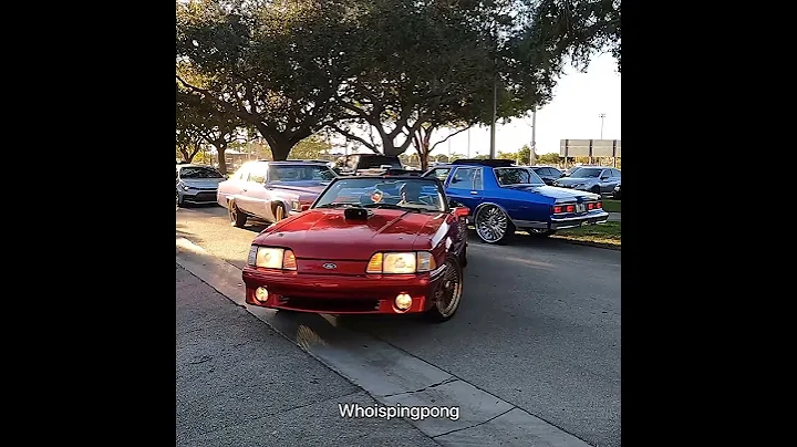 Candy red mustang fox body 5.0 on gold Daytons doing a burnout