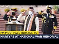 Pm modi pays homage to martyrs at national war memorial