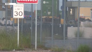 Medical Examiner completes autopsy on one of the victims found dead in a Union Pacific train car
