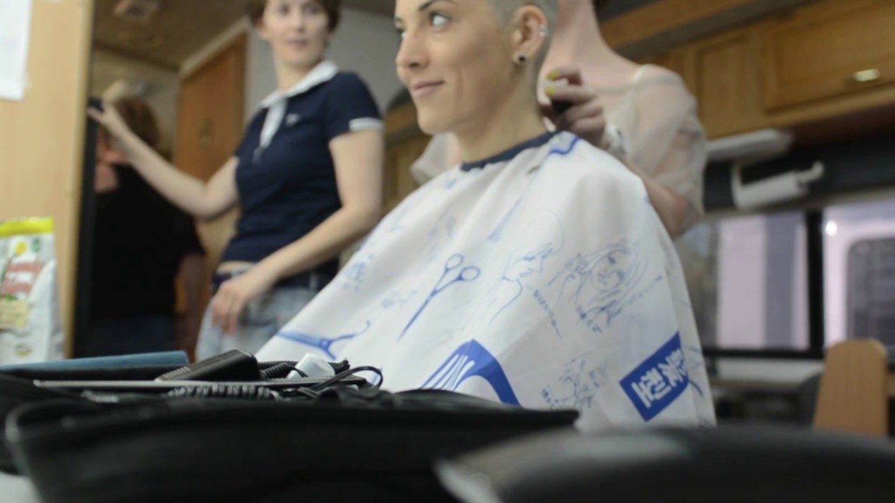 Cutting. Shaved hair woman. Irina Savina