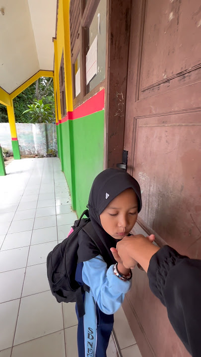 Anin shakes hands with her mother